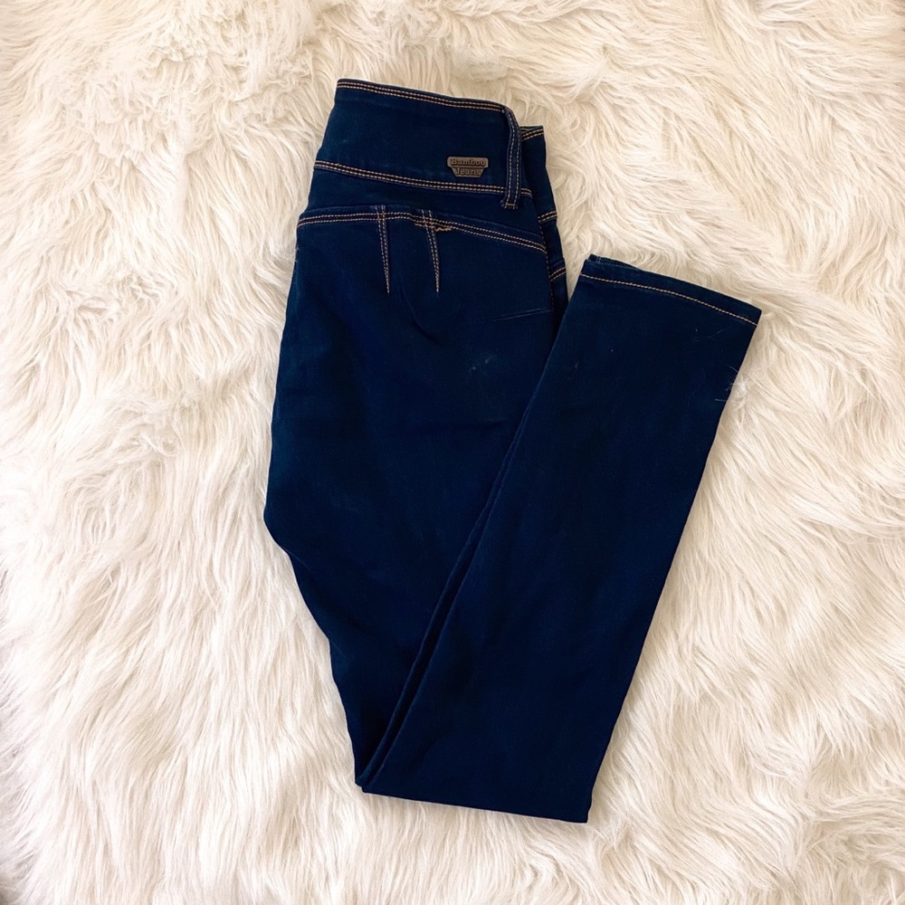 High waisted triple button jeans